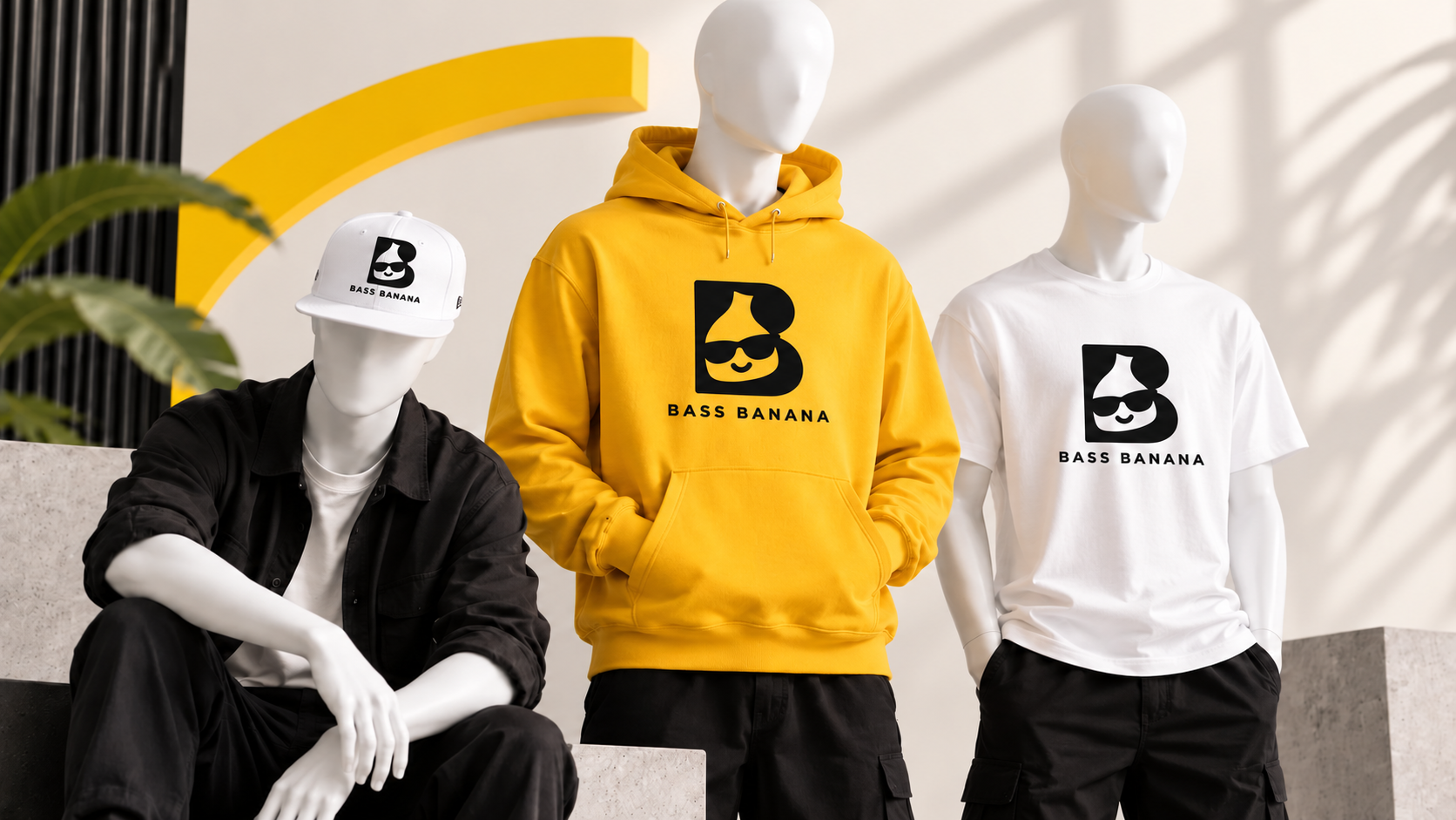 Bass Banana streetwear showcase with mannequins wearing the cap, hoodie and classic tee